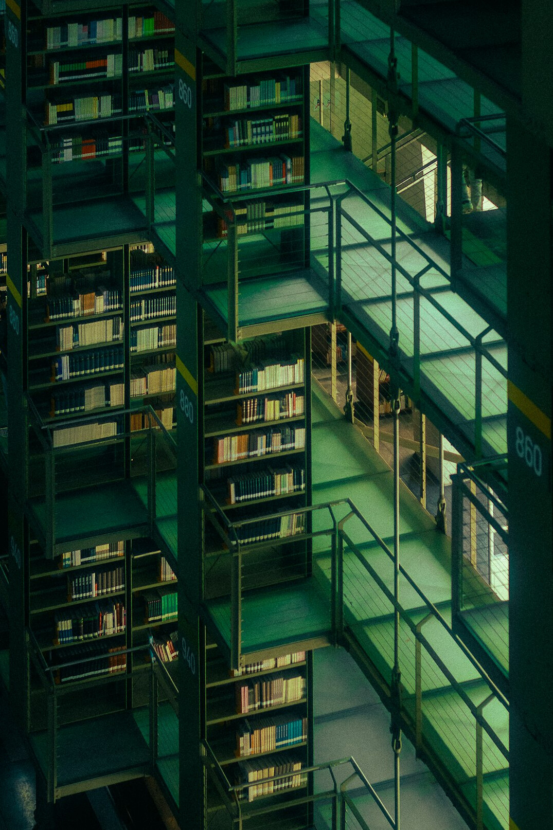 Research archive with books and binders on shelves